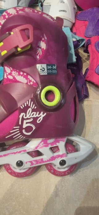 Patines talla 34-36  y 2 pares protecciones niña
