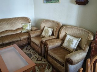 Conjunto de sofás y sillón
