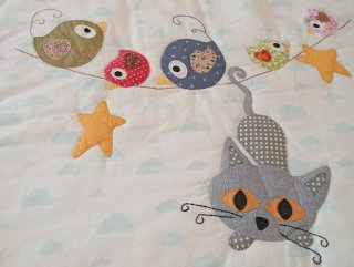 Protector de cuna infantil con animales