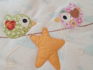 Protector de cuna infantil con animales