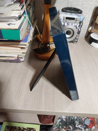 Marco de terciopelo con relieve azul y dorado