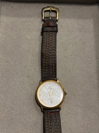 Reloj MINISTER dorado y marrón