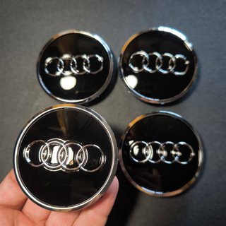 TAPABUJES AUDI 61mm NEGRO - EMBLEMA LLANTAS AUDI