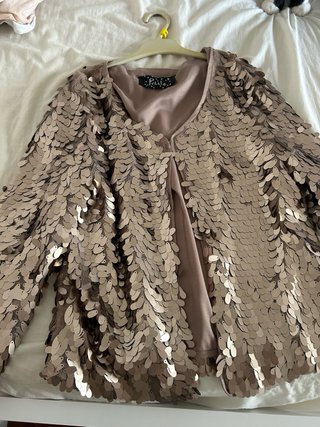 Chaqueta de fiesta lentejuelas flecos