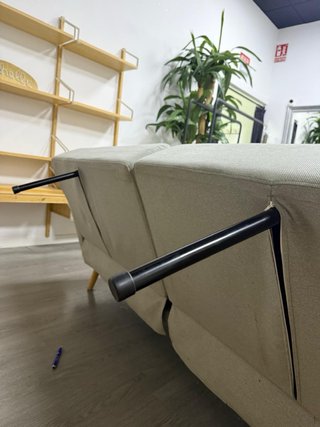 Sofá cama tela beige y madera