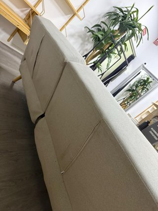 Sofá cama tela beige y madera