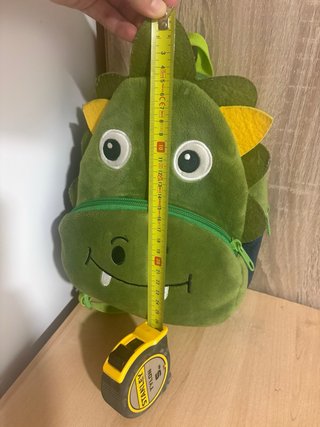 Mochila infantil de dinosaurio verde