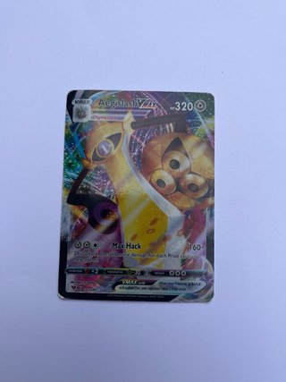 Carta Pokémon Aegislash VMAX 320 HP ingles