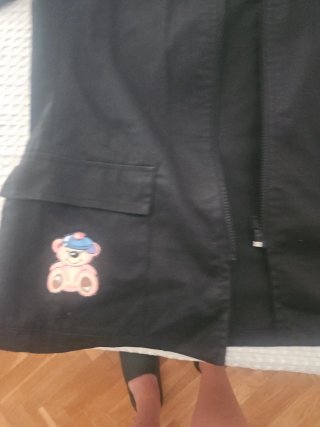 Chaqueta maestra negra con dibujos