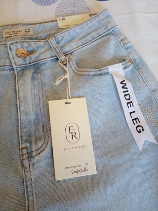 Pantalón vaquero ancho estrellas plateadas T40