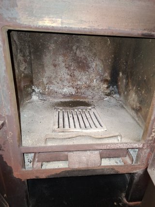 Estufa de leña de esquina negra, con turbina...