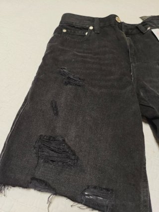 Pantalón vaquero negro desgarrado Totalmente nuevo