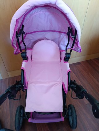 Carrito de muñecas rosa y morado