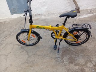 Bicicleta plegable Moma Ricola amarilla