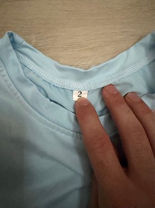 Camiseta azul con dibujo de oso