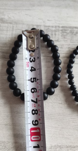 2 Pulseras Negras con Detalle Dorado