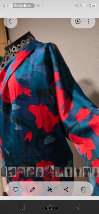 Blusa asimétrica floral tirante fino