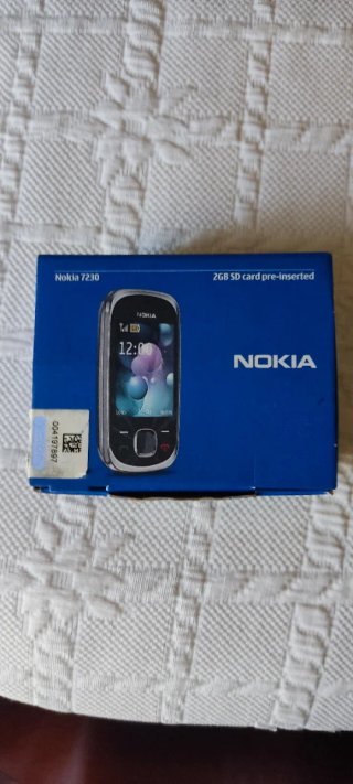Teléfono Nokia 7230 Rosa y Plata