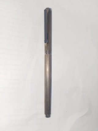 Bolígrafo antiguo de plata