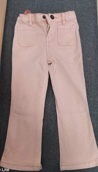 Pantalón niña rosa acampanado
