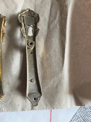 Tiradores de bronce antiguos