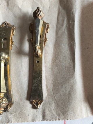 Tiradores de bronce antiguos