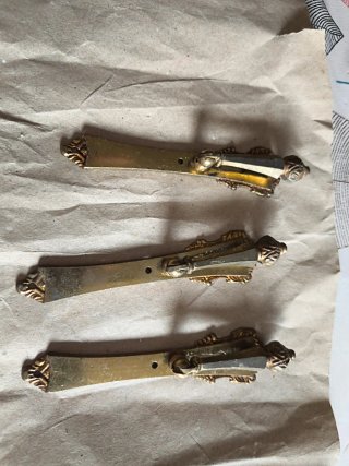 Tiradores de bronce antiguos