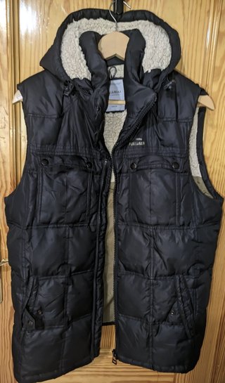 Chaleco Pull&Bear plumas y borrego