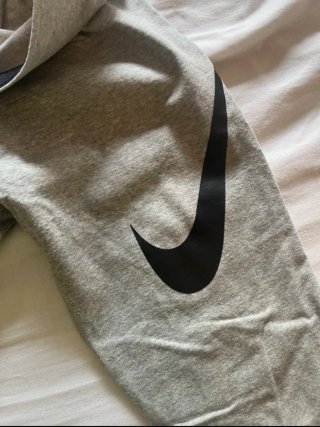 Mallas Nike grises con logo