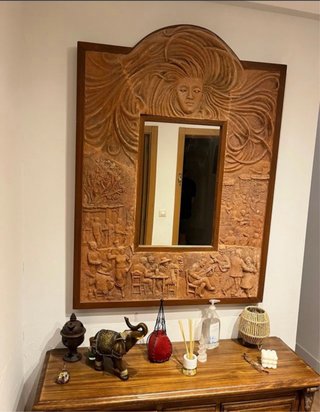 Espejo de piedra con marco de madera