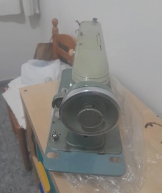 Máquina de coser Sigma verde