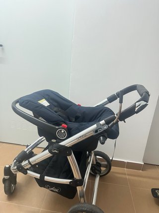 Carro de bebé con silla de coche