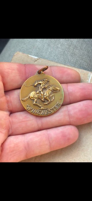 Medalla Winchester jinete vaquero