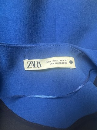 Chaleco Zara azul botones