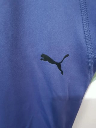 Mallas deportivas Puma moradas.