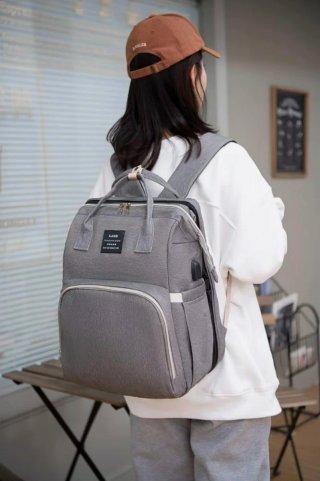 Mochila para pañales con cuna