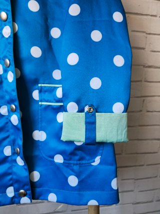 Impermeable Kling azul lunares blanco Talla M