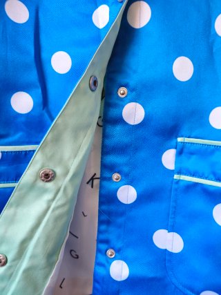 Impermeable Kling azul lunares blanco Talla M