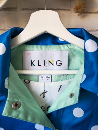 Impermeable Kling azul lunares blanco Talla M