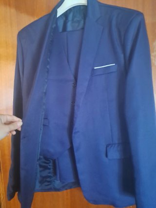 Traje de chaqueta y chaleco azul