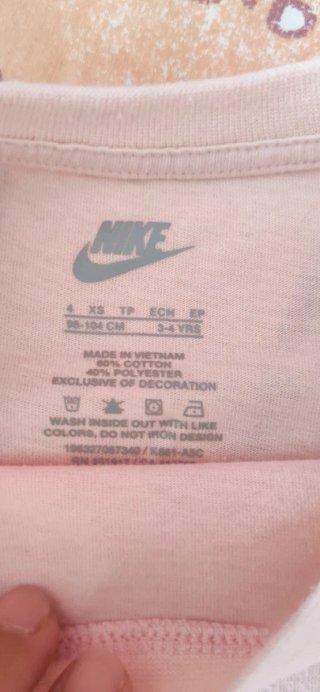 Conjunto deportivo niña Nike rosa y naranja flúor