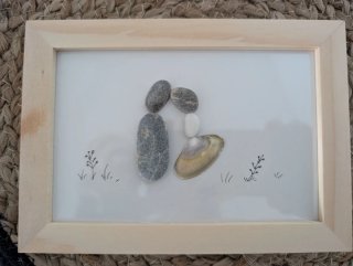 Cuadro decorativo de piedras y concha