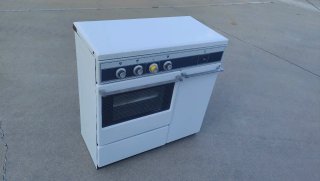 Cocina y horno de gas blanca