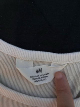 Camiseta H&M beige con estrella Talla XXS
