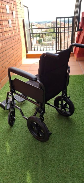 Silla ruedas abatible.