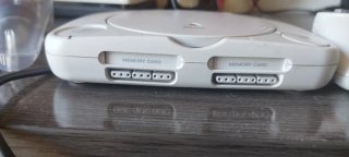 Ps one con 2 mandos y tarjetas memoria