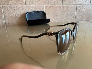 Gafas de sol Gucci marrón y doradas