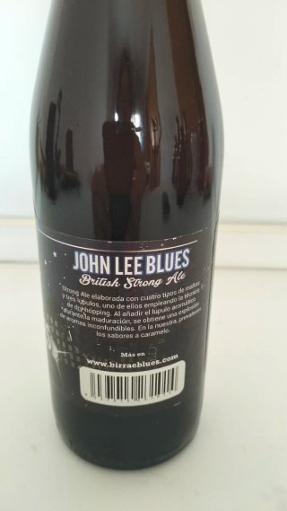 Botella de cerveza "vacía" John Lee Blues