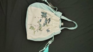 Bolso de mano estilo chino con borla