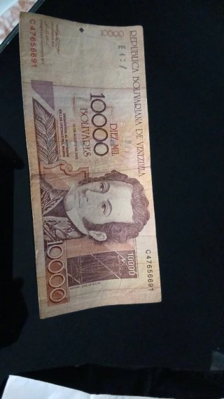 Lotto di Banconote Pesetas, Dollari e Bolivar